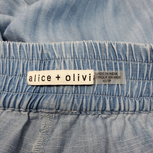 ALICE + OLIVIA BENNY FRAYED ANKLE WIDE LEG CHAMBRAY PANTS - Picture 10 of 12